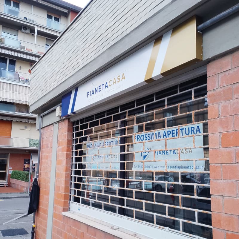 insegna negozio scandicci